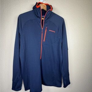 Patagonia Men's Dark Blue Jacket with Bright Orange Trim